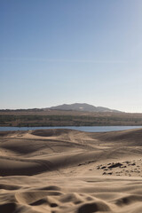 Fototapeta na wymiar White Sand Dunes in Mui Ne, Phan Thiet, Vietnam. white sand desert