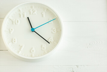 white clock on white background, time and watch, white style in interior