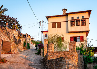 Fototapeta na wymiar Mansions in Afissos, a small village on the slopes of Mount Pelion, Greece.