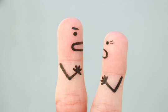 Fingers art of couple during quarrel.