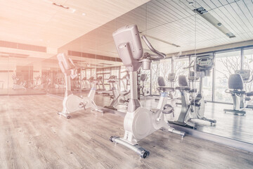 Fototapeta na wymiar Fitness gym with the modern sport equipment. Fitness gym is a modern lifestyle for sport workout