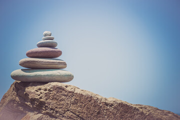 Stack of zen stones near sea. Harmony, balance