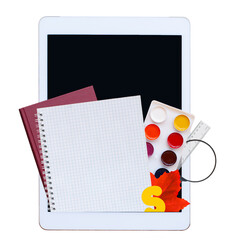 digital tablet with notebook, book, paints, ruler, magnifing glass and maple leaf on the white background