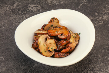 Roasted champignon with herbs and spices