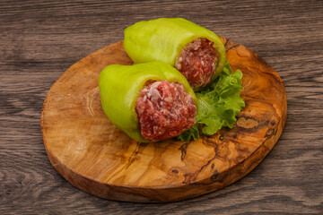 Raw stuffed bell pepper with meat