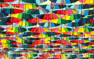 Colorful texture with umbrella. Multicolor background. LGBT colors.