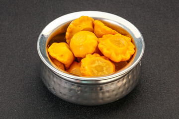 Marinated yellow patisson in the bowl