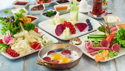 Delicious traditional turkish breakfast on wooden table