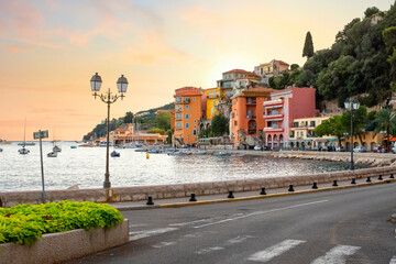 A colorful sunset on the Cote d'Azure at the seaside town of Villefranche Sur Mer, France, on the French Riviera.