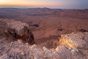 Israeli desert in Ramon crater rim, view on valley and canyon