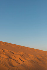 Fototapeta na wymiar sunset in Red sand dunes mui ne vietnam sand desert