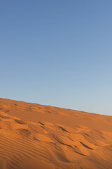 Fototapeta na wymiar sunset in Red sand dunes mui ne vietnam sand desert