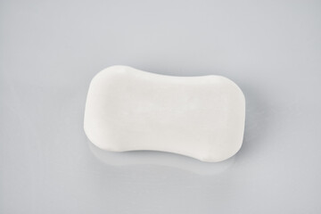 Bar of soap on gray background