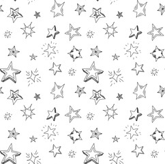 Hand drawn stars doodle seamless pattern. Background with stars for decoration isolated on white background.