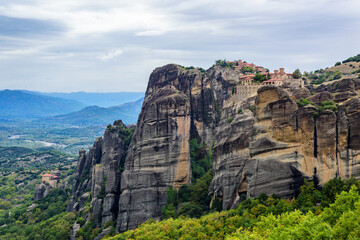 View of the stunning rock formations of Meteora and Holy Monastery of the Transfiguration of Christ, Monastery of Varlaam and Holy Monastery of Saint Nicholas Anapafsas at Meteora