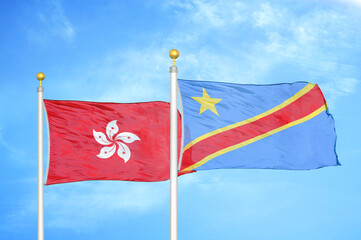 Naklejka na ściany i meble Hong Kong and Congo Democratic Republic two flags on flagpoles and blue sky