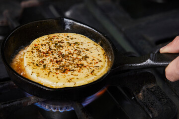 Cooking Provoleta Argentina / Provolone Chesse.