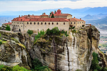 Fototapeta na wymiar Panoramic view of the mountain formations of Meteora and Monastery of St. Stephen