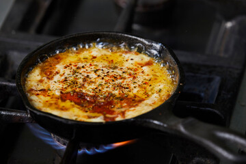 Cooking Provoleta Argentina / Provolone Chesse.