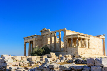 Fototapeta premium The Erechtheion is a temple in the Acropolis of Athens Honoring Athena and Poseidon, this famous, ancient Greek temple features a porch with 6 caryatids. 