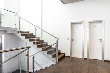 staircase in a modern building, toilet door