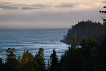 sunset over foggy sea on the west coast