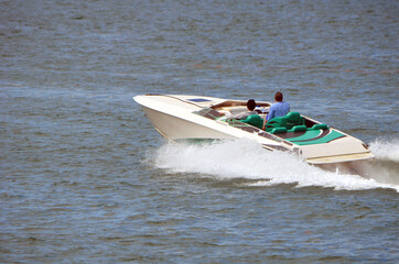 Motor Boat cruising at high speed on Biscayne Bay off of Miami Beach,Florida