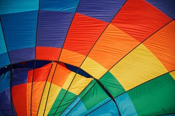 Fototapeta premium Element of the outer surface of a multicolor balloon. Rainbow colors and pride flag. Diversity and freedom