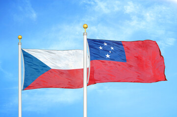 Czech and Samoa two flags on flagpoles and blue cloudy sky