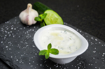 Delicious Lebanese food, Tzatziki sauce, produced with garlic, cucumber, mint and labneh.