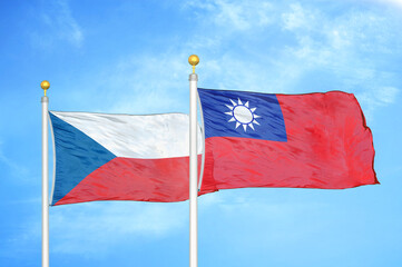 Naklejka na ściany i meble Czech and Taiwan two flags on flagpoles and blue cloudy sky