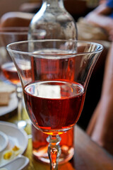 Rose wine glass on table
