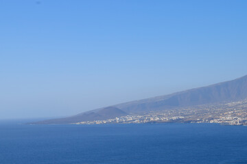 Fototapeta na wymiar Landscape from Santa Cruz de Tenerife, Canary Islands, Spain. Coast of the islands, and towns over the seashore
