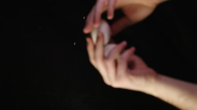 Two egg-breaking chef, bottom view slow motion 4k food footage