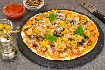 Pizza with mussels, mushrooms, green olives