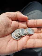 coins in hands