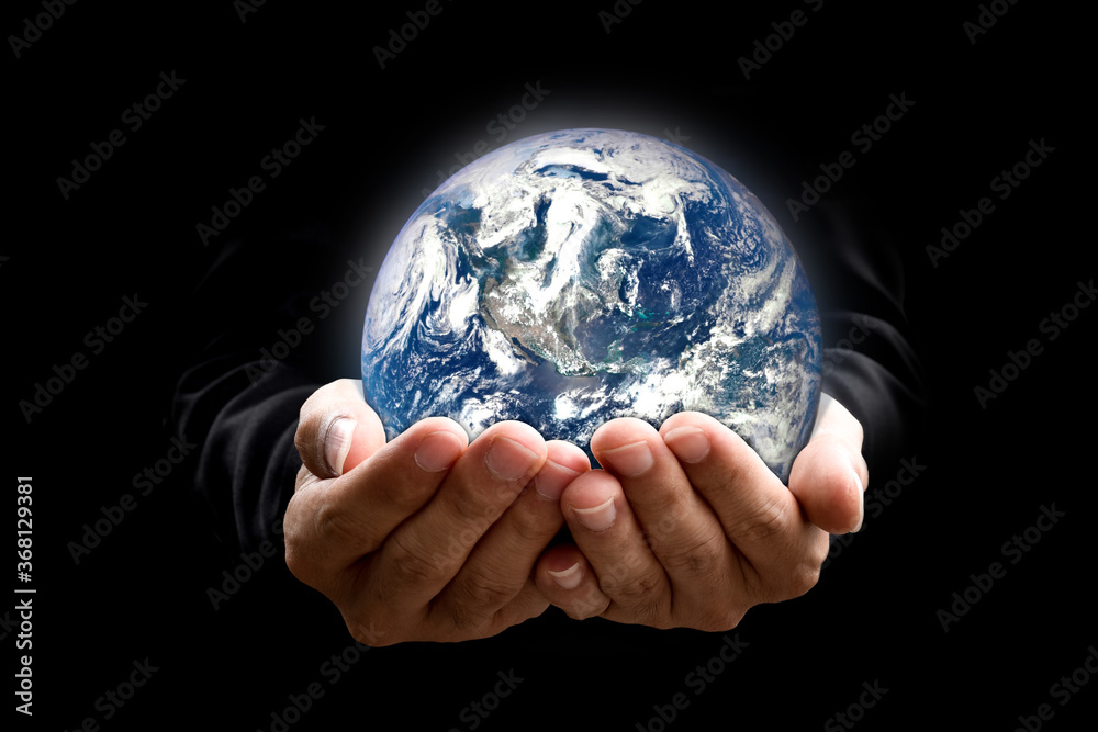 Canvas Prints environment concept. earth in hands on black background. elements of this image furnished by nasa