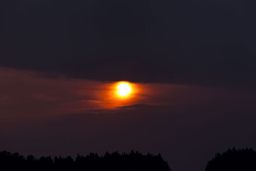 the sun shining in the sky