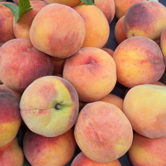 Fototapeta na wymiar Ripe sweet aromatic peach, for background.