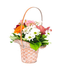 Fototapeta na wymiar Wicker decorative basket with bouquet of beautiful flowers isolated on white background