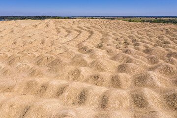 Aerial view of a sand pit in the form of dunes in Russia