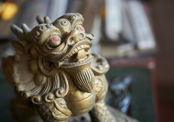 Bronze dragon statue in a Chinese Buddhist temple, China.