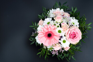 Bright spring flowers, composition on black background.