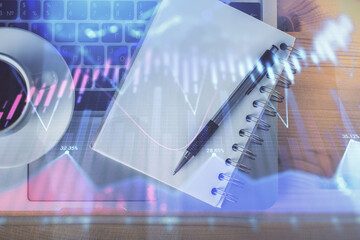 Multi exposure of forex chart drawing and work table top veiw. Concept of financial analysis.