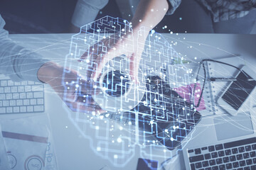 Double exposure of man and woman working together and human brain hologram drawing. Brainstorm concept. Computer background. Top View.