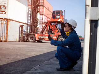 Foreman businessmen engineering  manager wear uniform company concept is working at site warehouse forklift container terminal logistic import export international construction commercial 