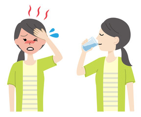 Young woman rehydrating, heat stroke