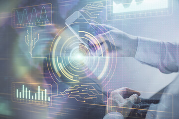 Double exposure of man's hand holding and using a digital device and data theme drawing. Technology concept.