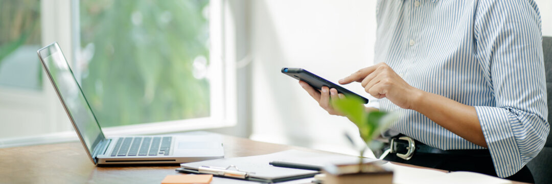 woman using cell phone at home, Online learning.