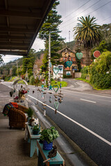 Colorful wind chimes outside of a store 1